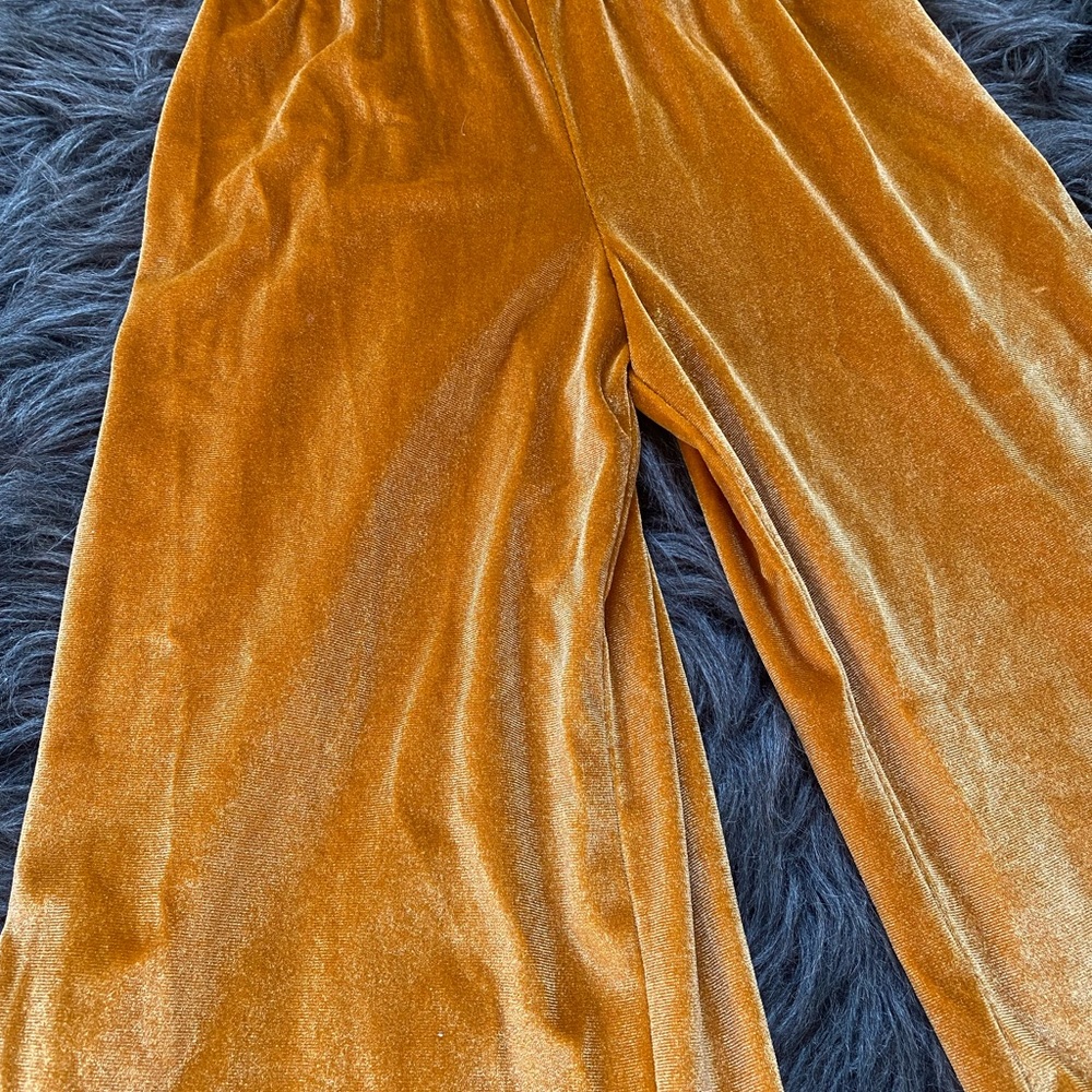 Gold velvet jumper.